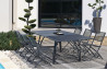 Ensemble table et 6 chaises perforées
