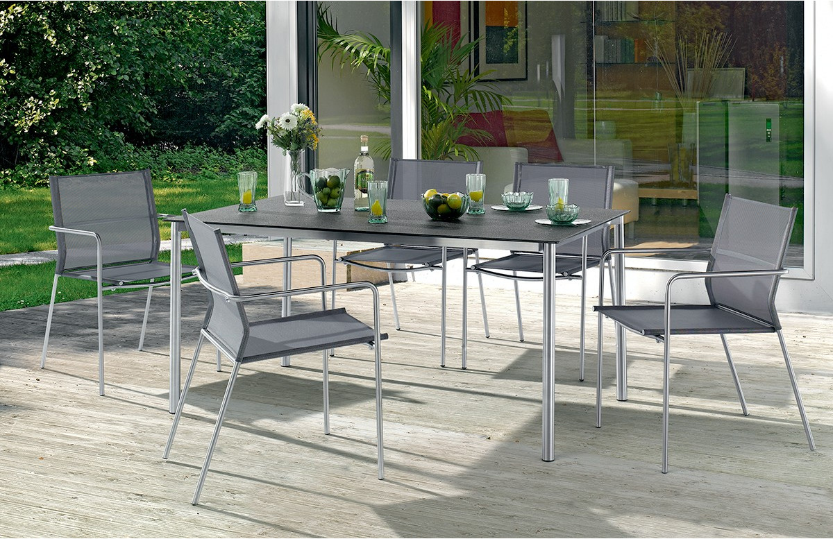 Table Superstone gris foncé et 6 fauteuils