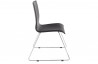 Chaise design noire en similicuir