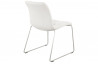 Chaise en similicuir blanche