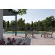 Pergola bioclimatique adossée Ombréa en aluminium 3x6 M